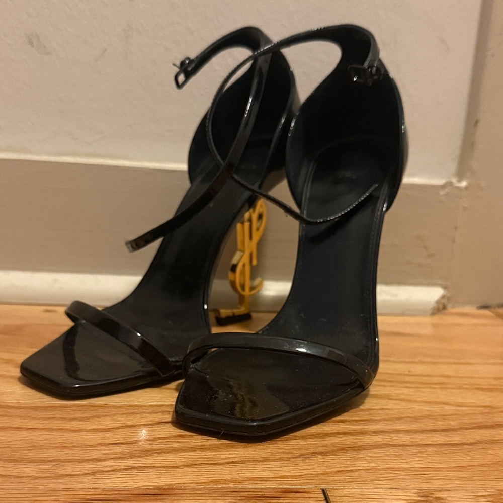 Yves Saint Laurent Black Patent Heels with Gold Logo authentic